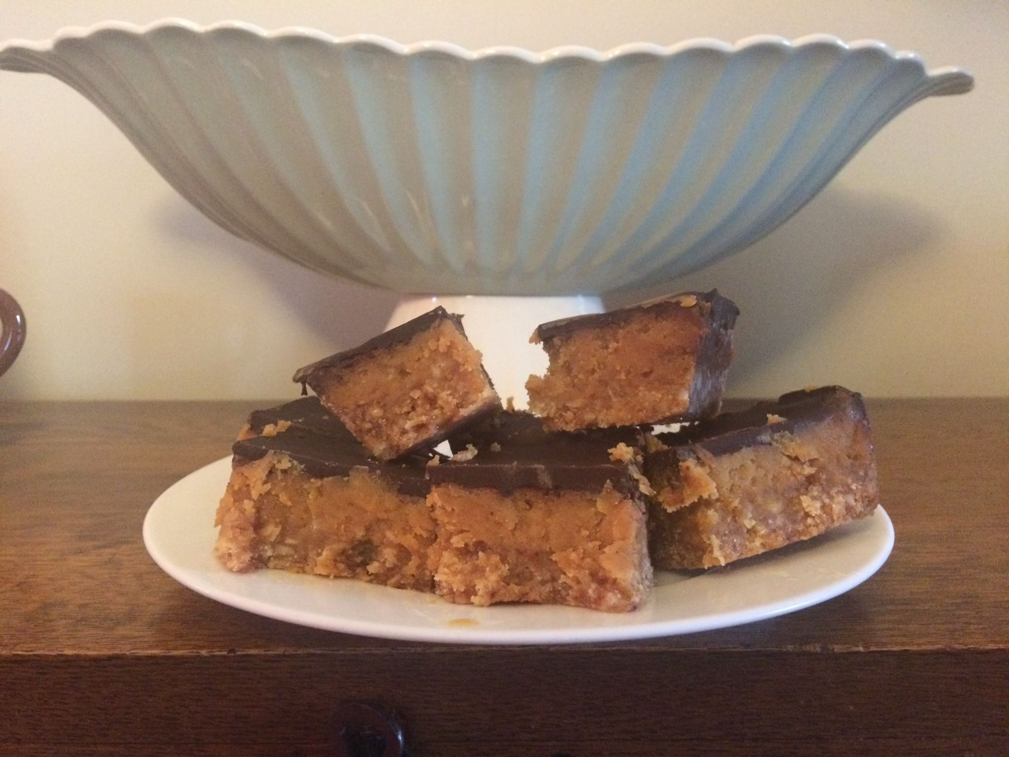 Caramel slice with biscuit base and chocolate topping